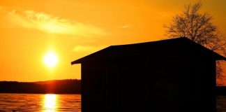 Solnedgång över Piteälven Solnedgång vid Piteälven, Sverige - Travel in Sweden